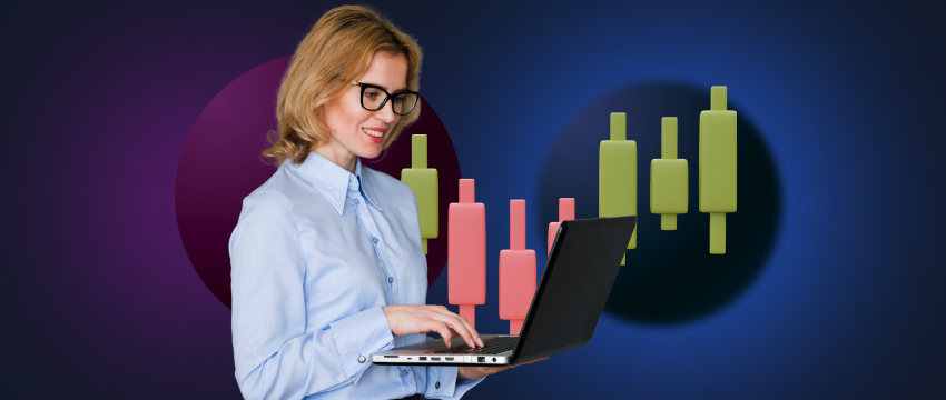 A woman with glasses, using a laptop, immersed in day trading and executing CFD trades.