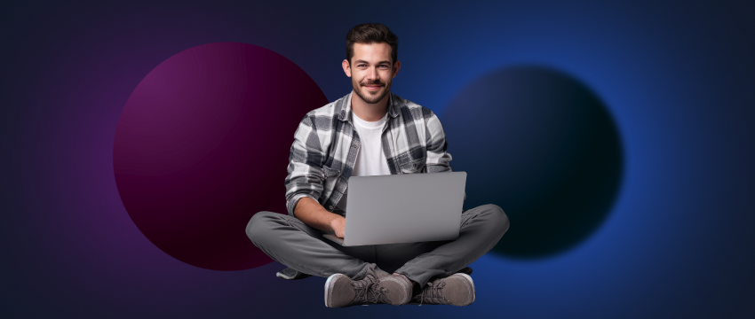 A forex broker sits on the floor with a laptop, contemplating his financial challenges and current lack of funds.